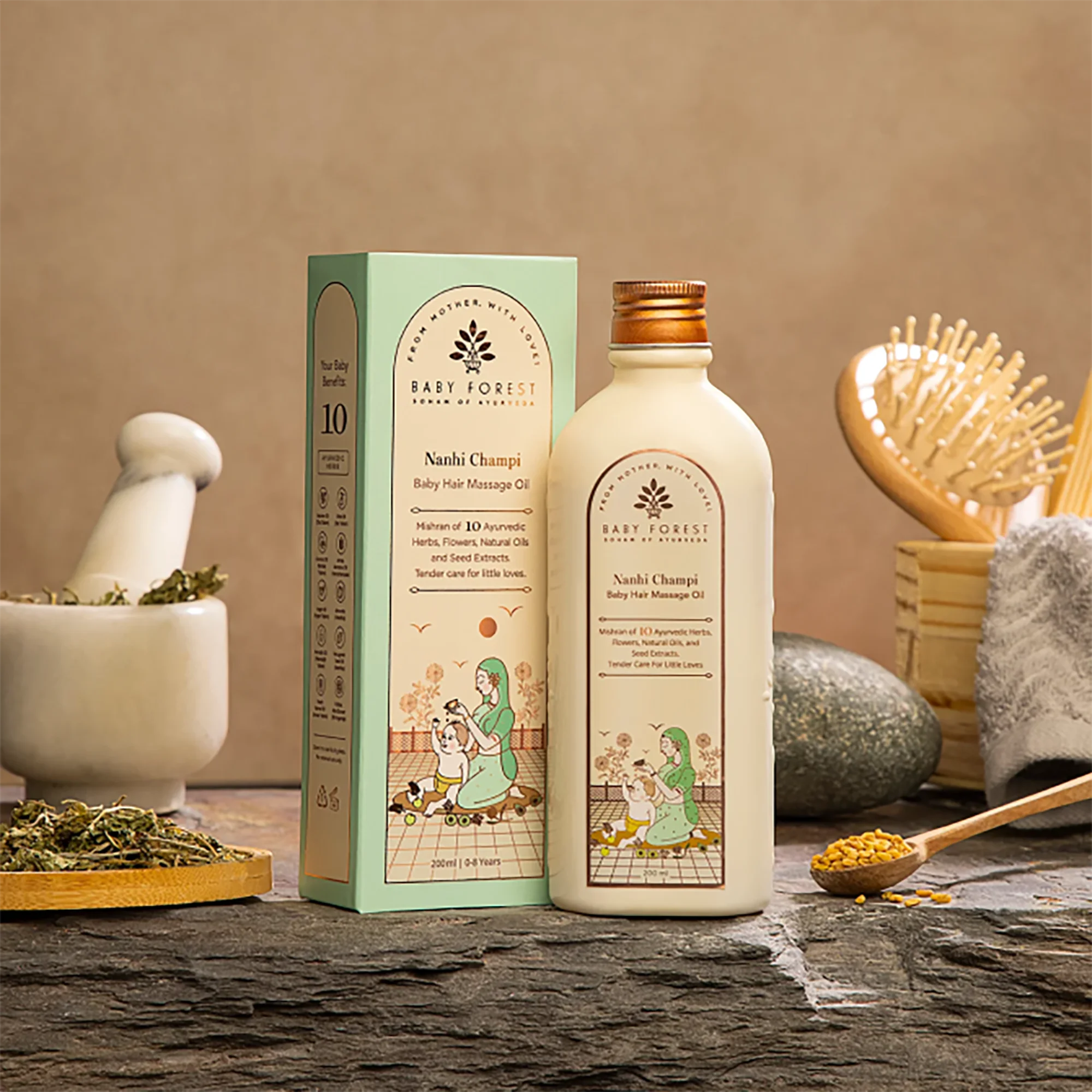 Baby Forest Nanhi Champi Baby Hair Massage Oil and packaging on a wooden surface with natural items.