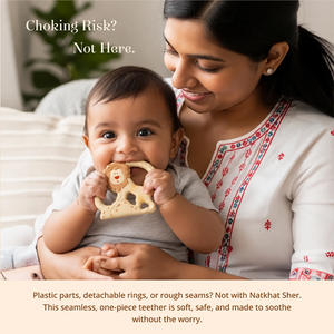A baby and mother holding a Natkhat Sher Natural Rubber Baby Teether while text overlays highlight product safety features like no choking risk and one-piece construction.