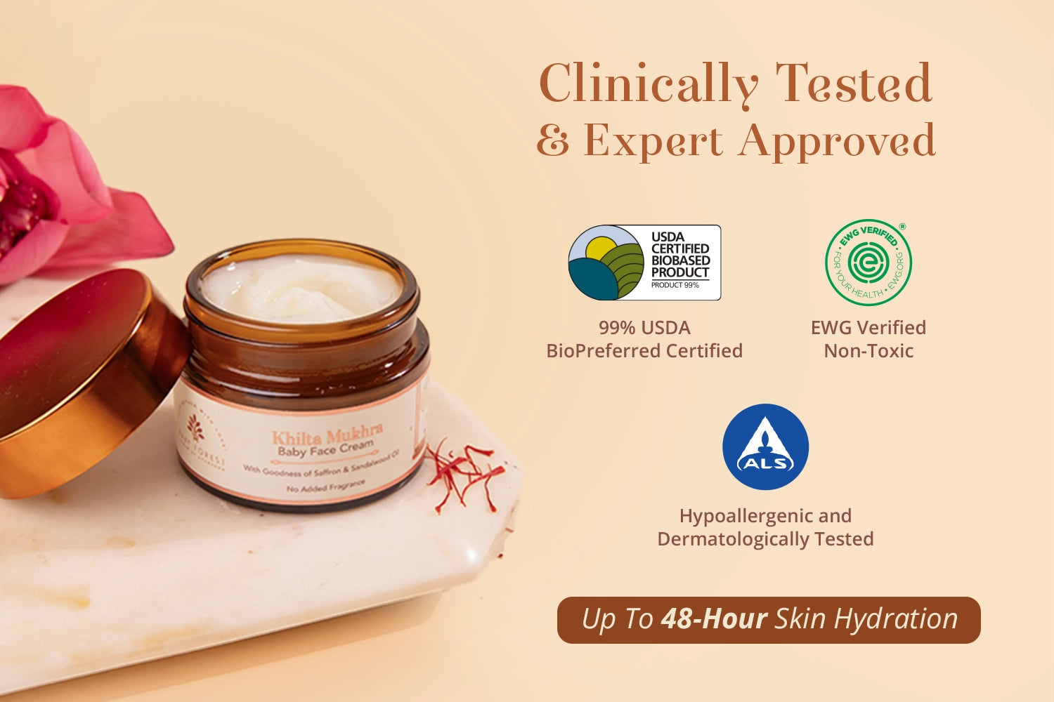 An open jar of Khilta Mukhra Baby Face Cream sits on a white marble slab with its lid beside it, set against a warm beige background with promotional text reading 'Clinically Tested & Expert Approved' and certification logos.