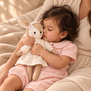 Cuddly Buddies Giraffe Girl Soft Toy with a Baby Girl