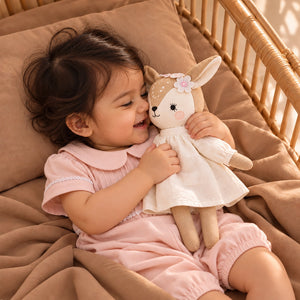 Cuddly Buddies Giraffe Girl Soft Toy with a Baby Girl 