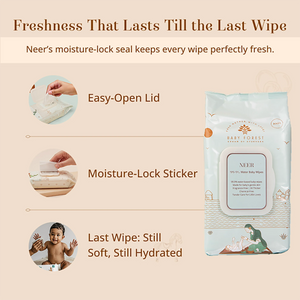 A package of Baby Forest Soft & Clean Neer 99.9% Wet Baby Wipes shown on a beige promotional background with feature callouts: Easy-Open Lid, Moisture-Lock Sticker, and Last Wipe: Still Soft, Still Hydrated. A baby is pictured in one circular inset, but the main subject is the product package and marketing layout.